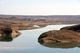 Image du Maroc Professionnelle de  Le barrage Laghrasse "dit barrage Hassan II", il se situe à 50 km au sud est de Taourirte au nord du Maroc, Samedi 10 Février 2006, ce barrage fournit en eau potable  le barrage Mohammed V qui sert de lien pour Machraa Hammadi,  ce dernier permet l'approvisionnement des centre de Taourirte et El Aïoun Sidi Mellouk. (Photo / Abdeljalil Bounhar) 